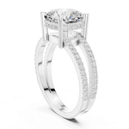 3 Carat Cushion Cut center stone with a split shank pavé band