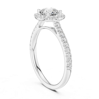1 Carat Cushion Cut center stone with a halo and pavé band