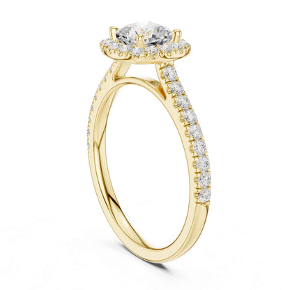 1 Carat Cushion Cut center stone with a halo and pavé band