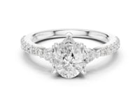 1.5 Carat Pear Shaped Lab Grown Diamond Three Stone Engagement Ring with Pavé Band
