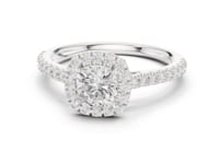 1 Carat Cushion Cut center stone with a halo and pavé band