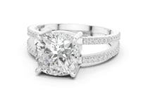 3 Carat Cushion Cut center stone with a split shank pavé band